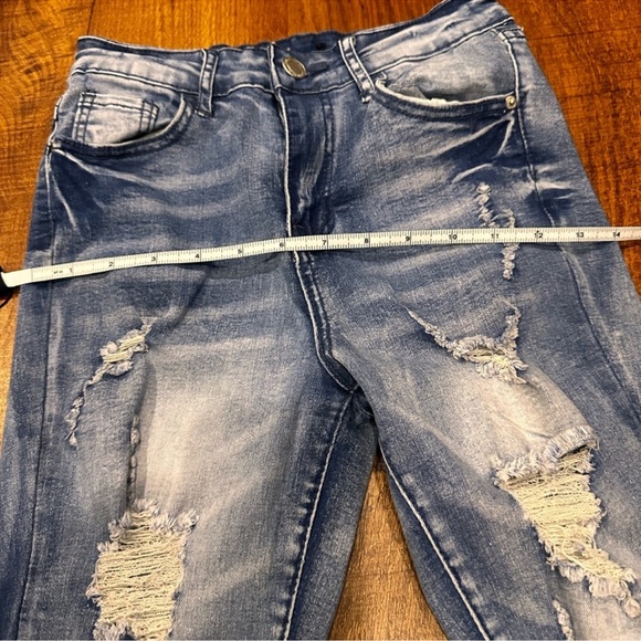 Set of Four Denim Jeans - Picture 9 of 16